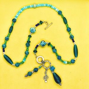 Music lovers Sundance inspired necklace. Pure silver clasp, turquoise stones